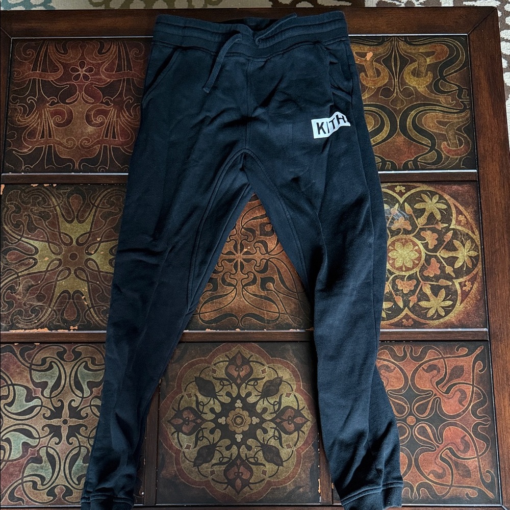 Kith Black Jogger Pants with White Logo Patch